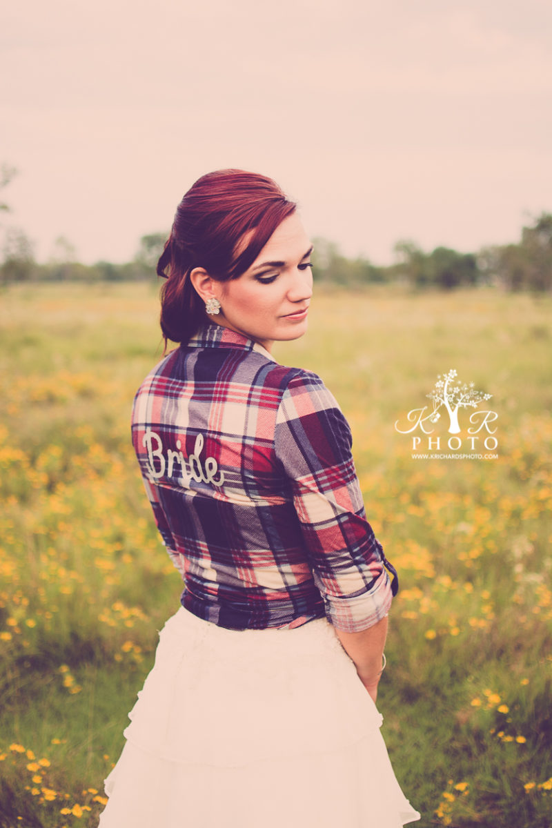 Bridal photographer in a wildflower field by Katy, Texas bridal photographer Kristen Richards Photography