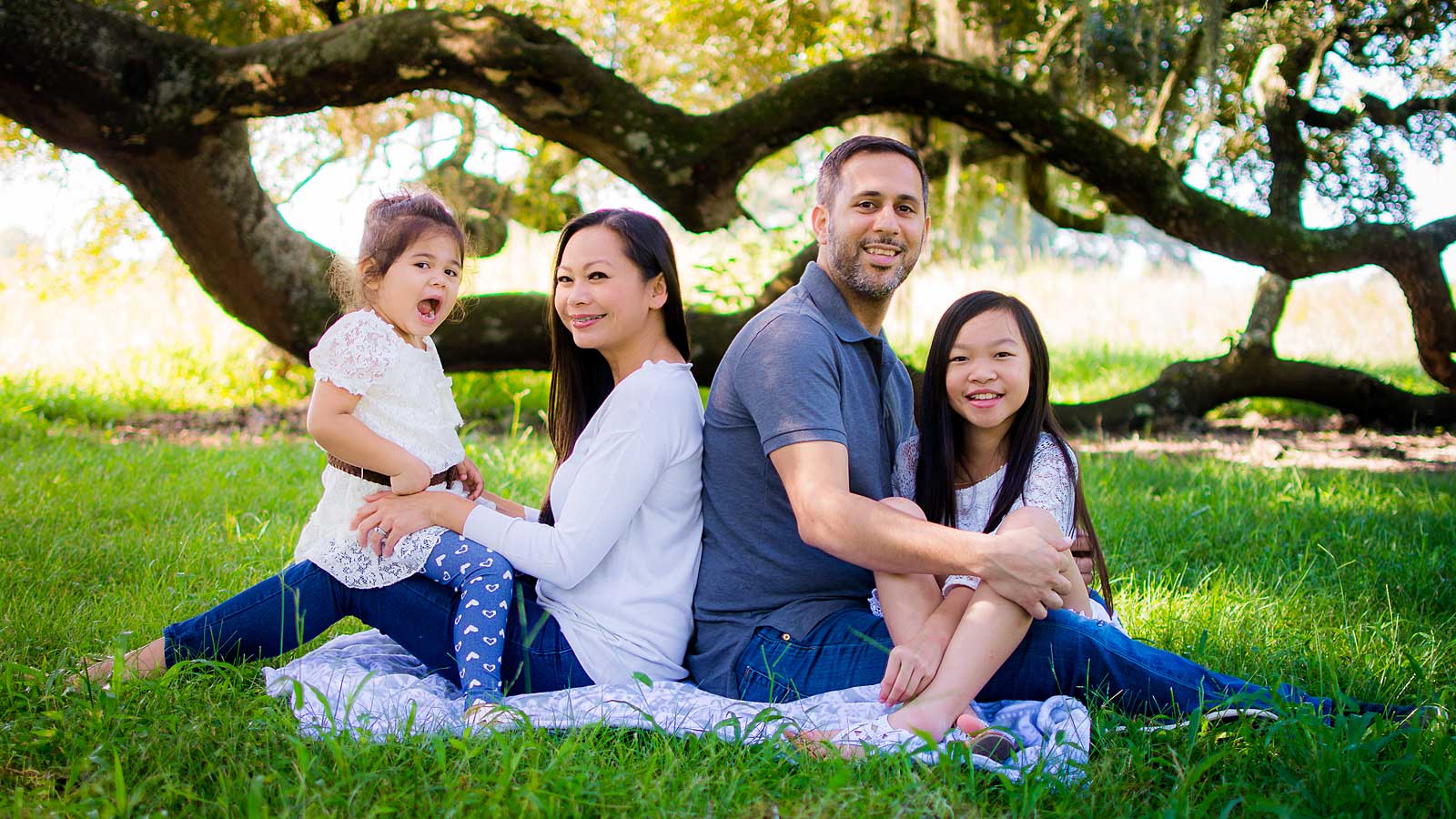 Outdoor family photo session under the oak trees by Needville, Texas family photographer Kristen Richards